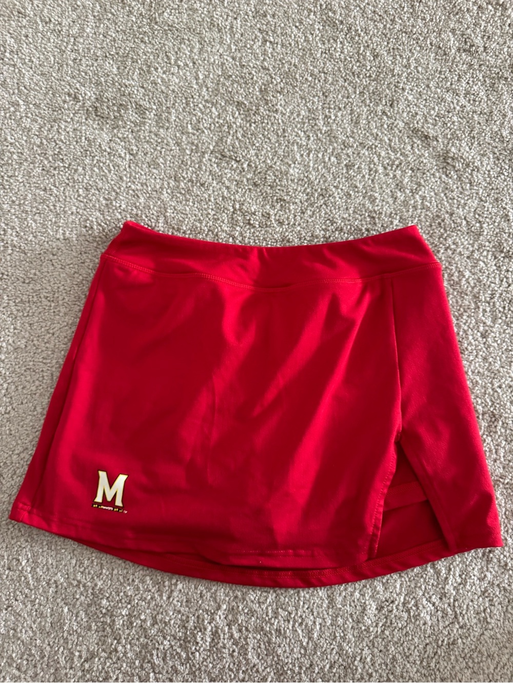 Red Athletic Mini Skirt with Gold 'M' Accent